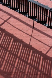 Shadows reflecting reality in Chinatown