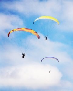 San Diego Paragliders Weightless in the Sky